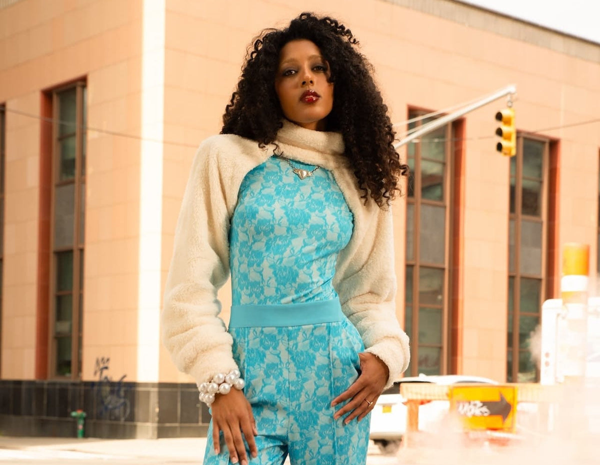 Model is wearing the Fellini jumpsuit