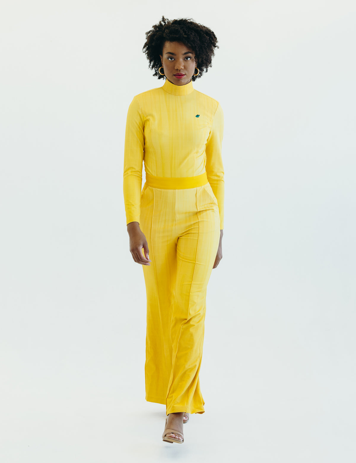 yellow nike jumpsuit