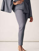 Model showcasing the stylish Cool Intentions Pant featuring double pleats and sleek design.
