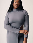 Model wearing Cut to the Chase Top featuring a unique cutout and sleek silhouette.