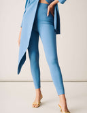 Keep It Moving Set - Marina showcasing an open back tux jacket and sleek pull-on pants in vibrant blue high-performance fabric.