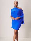 Modern Muse Dress featuring off-the-shoulder styling in vibrant blue color with slouchy silhouette and mid-thigh length.