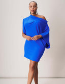 Modern Muse Dress featuring off-the-shoulder styling in vibrant blue color with slouchy silhouette and mid-thigh length.