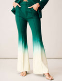 Power Shift Pant in Tropical Fade color with bell bottom styling and center pleats, paired with a matching blazer.