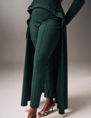 Woman wearing Promise Me Nothing Pant in green with matching top and stylish heels.