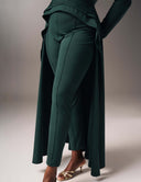 Woman wearing Promise Me Nothing Pant in green with matching top and stylish heels.