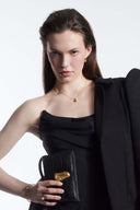 Model is wearing the Come Closer Dress