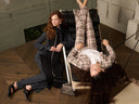 Two models sitting on the ground  - Model on the left is wearing Mrs Momma Bears Striped Night Suit Set.