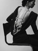 Model is wearing the No Turning Back dress in Obsidian