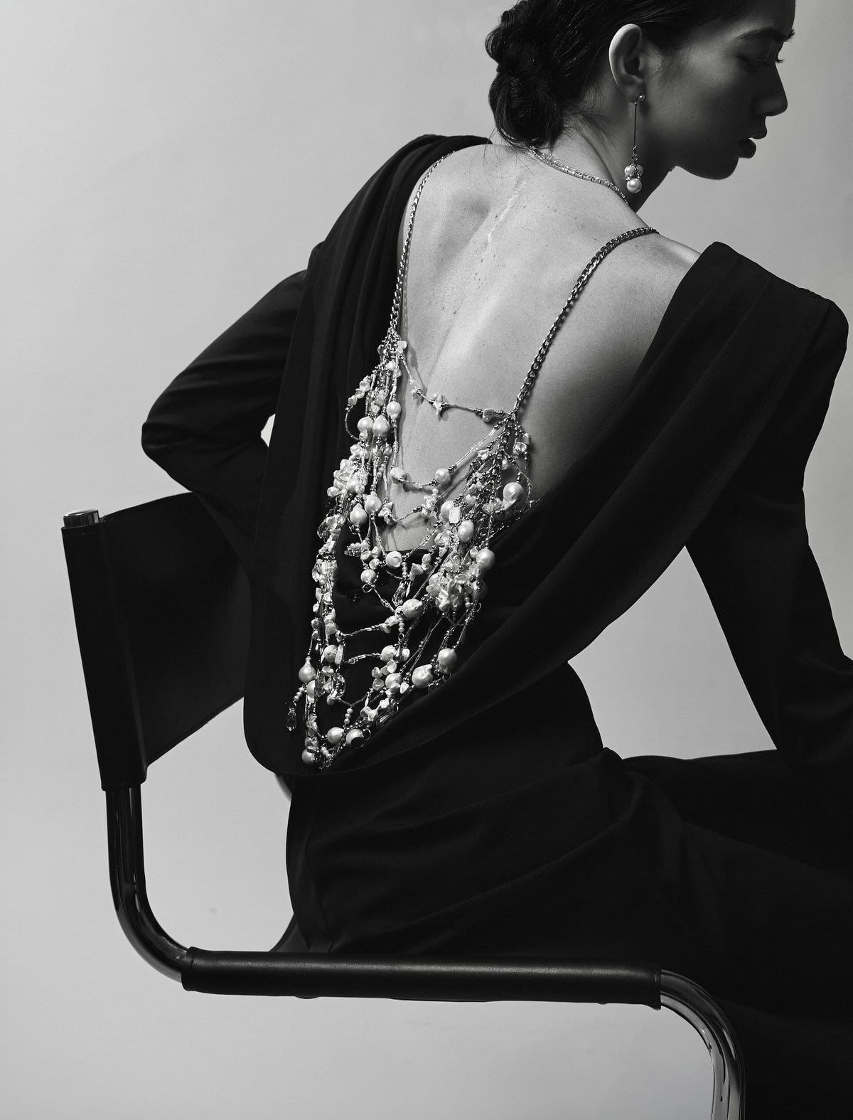 Model is wearing the No Turning Back dress in Obsidian