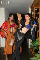 Model is wearing the Striped Night Blazer and Pant