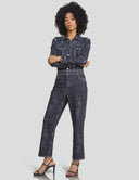 Dark denim-look jumpsuit with relaxed fit, front buttons, and stylish pockets, perfect for casual or dressed-up looks.