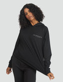 Woman modeling a Original MMB Hoodie with a relaxed fit, featuring a modern design and casual appeal.