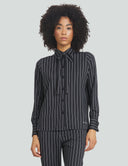 Striped night top with removable bow, fitted design, and cuffed sleeves, ideal for versatile styling and occasions.