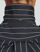 Back view of a striped night top featuring a high collar and button detail, perfect for versatile styling.