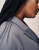 Close-up of the Cool Intentions Blazer showcasing the batwing sleeves and satin lapels.