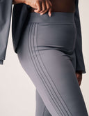 Model wearing Cool Intentions Pant showcasing double pleats and sleek fit, perfect for modern wardrobes.