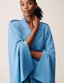 Model wearing the Cool Intentions Blazer showcasing batwing sleeves and satin lapels.