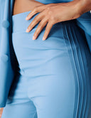 Cool Intentions Pant featuring double pleats and a sleek design, styled with a jacket.