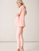 Model wearing Cool Intentions Pant paired with a matching top in a soft pink color.