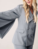 Cool Intentions Blazer with batwing sleeves and satin lapels, showcasing a stylish and modern design.
