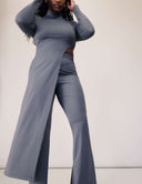 Cut to the Chase Pant in sleek gray, featuring a stylish cutout top and flared pant legs for a chic look.