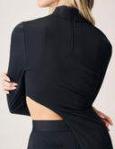 Back view of the Cut to the Chase Top showcasing the elegant cutout and back zipper detail.