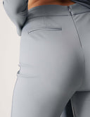 Cut to the Chase Pant in light blue, featuring a back pocket detail and tailored fit.