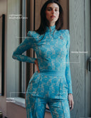 Model wearing Fellini outfit made with lightweight breathable fabric, featuring wrinkle-resistant and machine washable qualities.