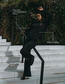 Model showcasing Fringy Baby jumpsuit with easy-care fabric, moisture-wicking, and four-way stretch features.