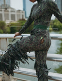 Going Somewhere jumpsuit featuring fringe, front pockets, and silky fabric, perfect for all-day wear.