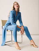 Model wearing Keep It Moving Set - Marina, featuring an open back tux jacket and matching sleek pants.