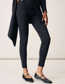 Stylish model wearing Keep It Moving Pant with sleek design and slim fit, paired with elegant flats.