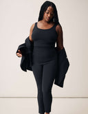 Model wearing a Luxe Tank Top with matching high-waisted pants, embodying minimalist style and comfort.