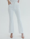 High-waisted white pants from 'Meet Me at Noon' offering a sleek and comfortable corporate look.