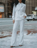 Meet Me at Noon Pant in a stylish white suit, featuring moisture-wicking and four-way stretch fabric.