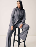 Perfect Form Blazer worn with matching pants, showcasing sophisticated tailoring and modern style.