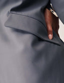 Detail view of functional pocket on the Perfect Form Blazer showcasing sophisticated tailoring features.