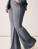 Close-up of Perfect Form Pant featuring bell bottom styling and tailored fit.