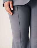 Close-up of the Perfect Form Pant showcasing tailored bell bottom design and center pleats.