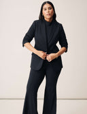 Perfect Form Blazer worn in a stylish outfit with matching pants, showcasing sophisticated tailoring and modern design.