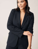 Model wearing the Perfect Form Blazer styled elegantly, showcasing sophisticated tailoring details.