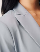 Close-up of the Perfect Form Blazer showcasing its tailored collar and soft fabric.
