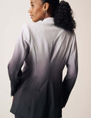 Woman wearing the Power Shift Blazer in Tropical Fade, showcasing sophisticated tailoring and gradient design.