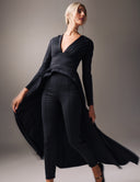 Model wearing Promise Me Nothing - Obsidian set featuring a deep V-neck top and high-waisted tapered pants.