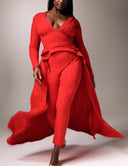 Model wearing the Promise Me Nothing - Rosso set with a long-sleeve top and high-waisted pant in vibrant red.