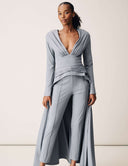 Model wearing the Promise Me Nothing Pant and matching top in light blue, showcasing stylish design and high-waisted silhouette.